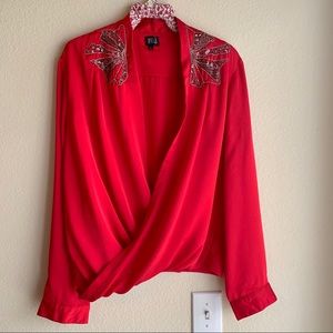 Embellished draped blouse